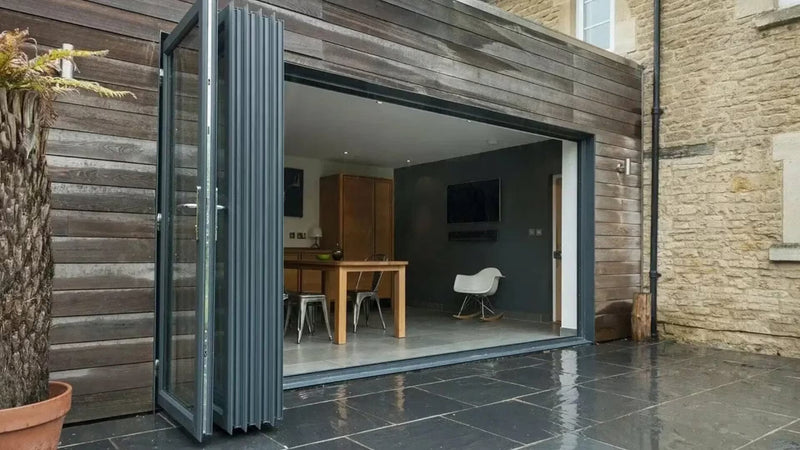Choosing the Best Between Aluminium Sliding Doors or Bifolds for Small Patios - Shield Doors & Windows