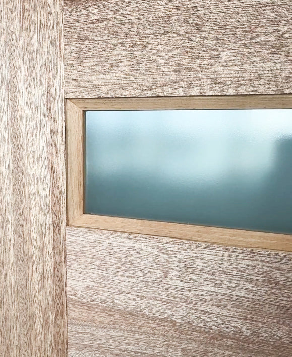 Close-up of Meranti timber grain on Malibu 4 Lite entrance doors