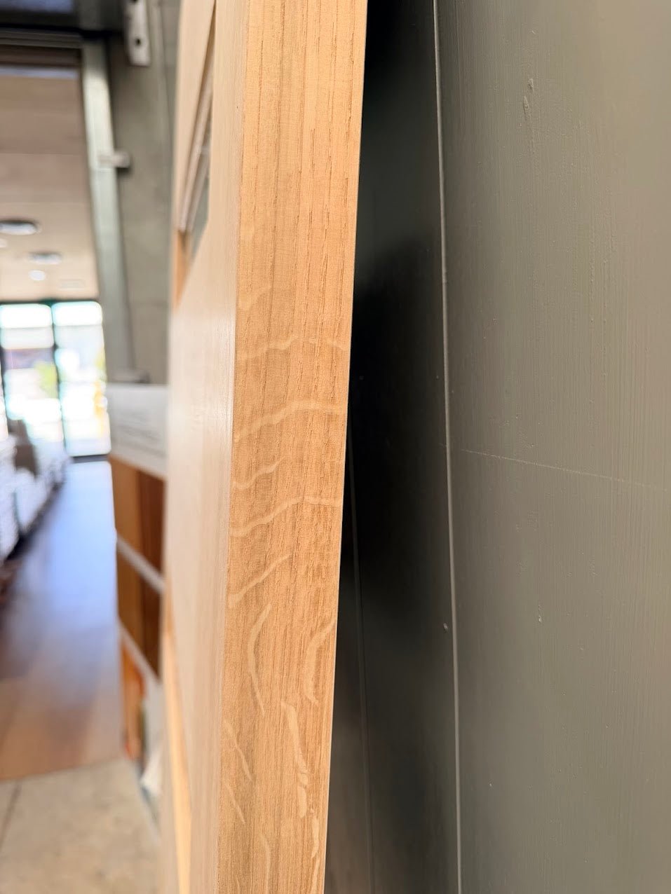 "Close up of hardwood grain on Malibu timber entrance door