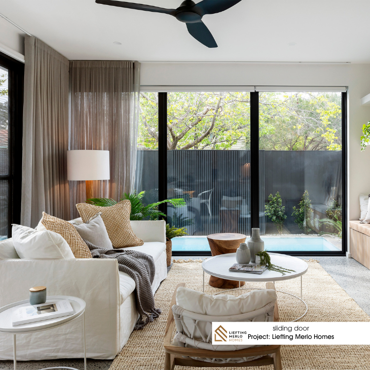 residential sliding stacker door installed in living room 