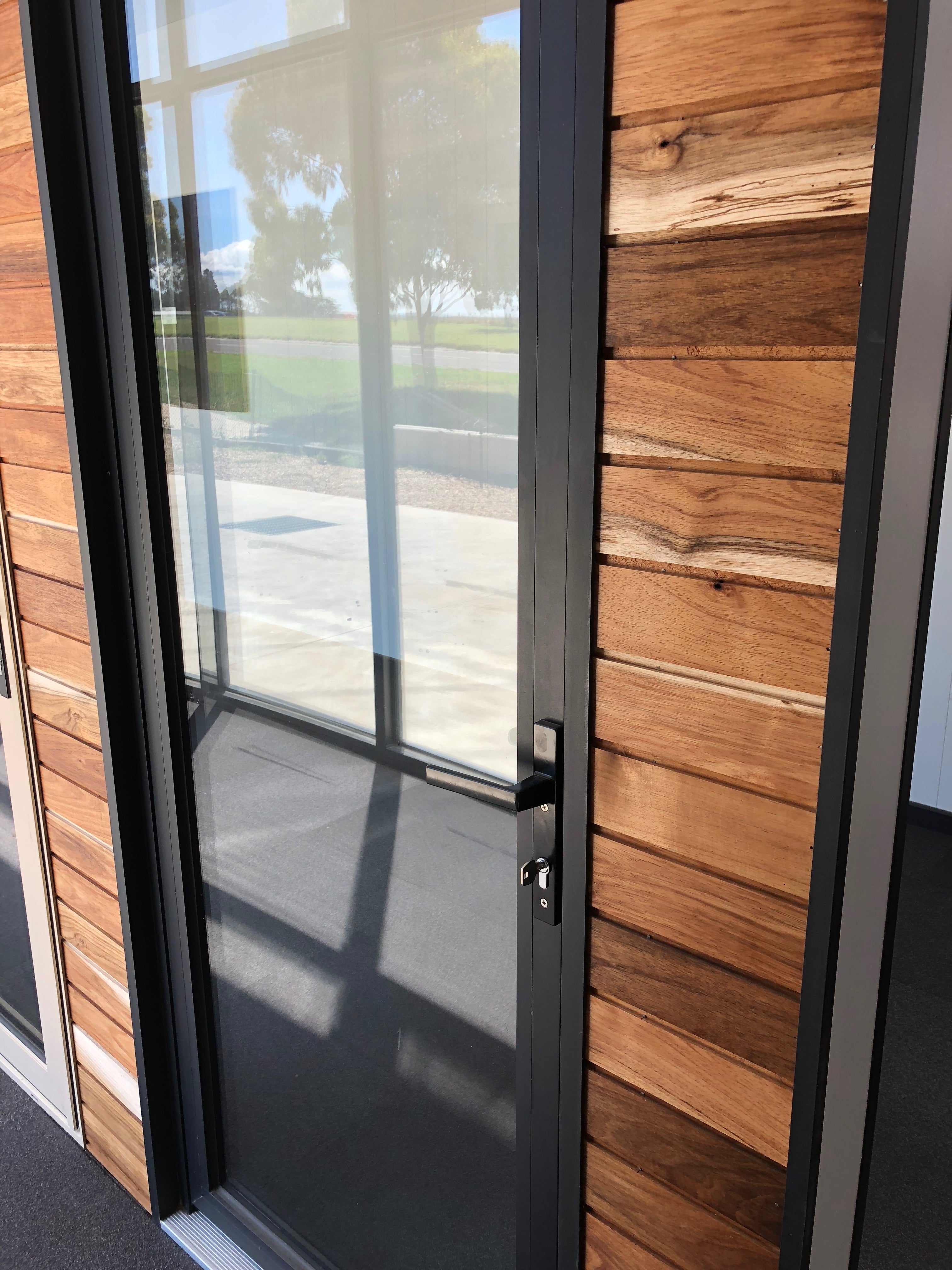 Custom external aluminium sliding doors installed in Australian home